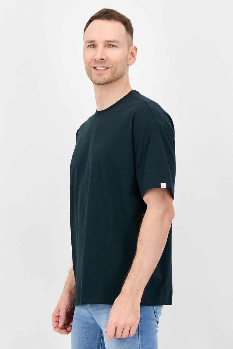 Fudo تي شيرت قصير الأكمام بتصميم فضفاض للرجال، لون غابة داكنة - Image 2